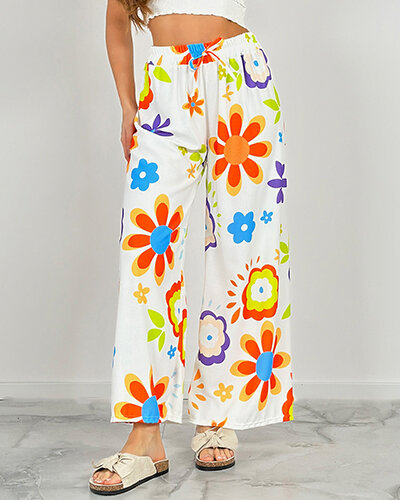 Royalfashion Szerokie spodnie damskie materiałowe w kwiaty
