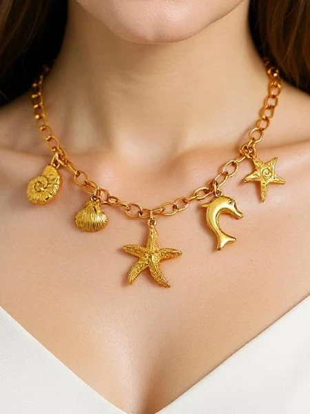 Naszyjnik Atena Charm Sea – złote amulety z motywami morskimi