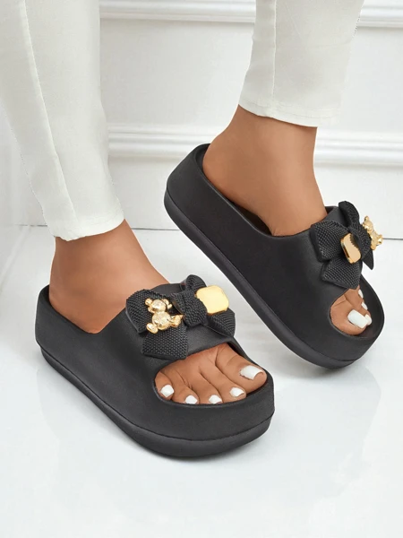 Royalfashion Damskie gumowe klapki z ozdobną kokardką Alday