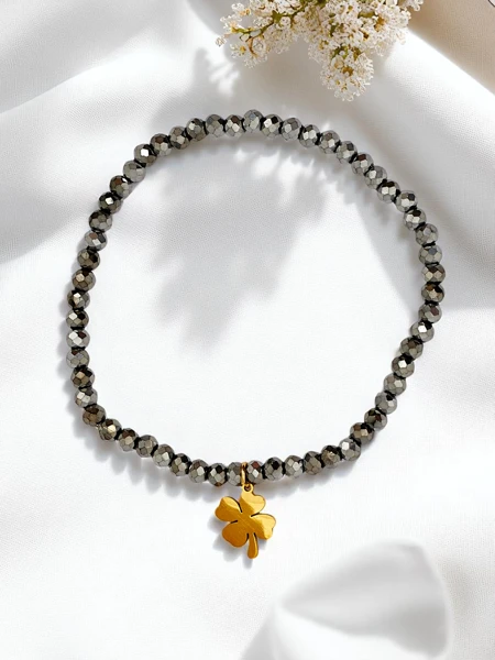 Royalfashion Bransoletka damska z zawieszką koniczynki