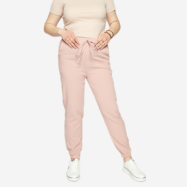 Royalfashion Damskie różowe spodnie materiałowe typu joggery PLUS SIZE