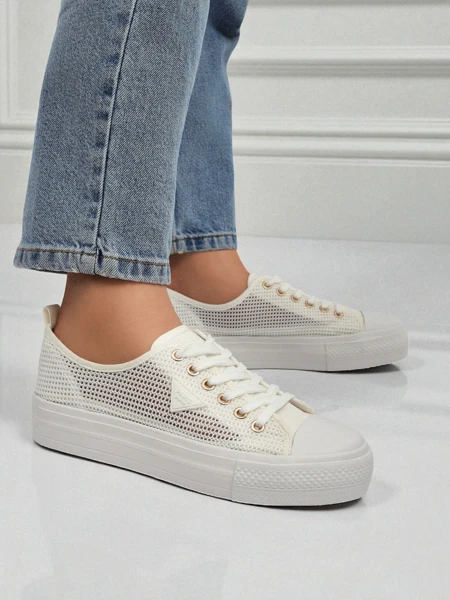 Жіночі білі снікерси Ariadne Mesh - дихаючі кеди на плоскій підошві