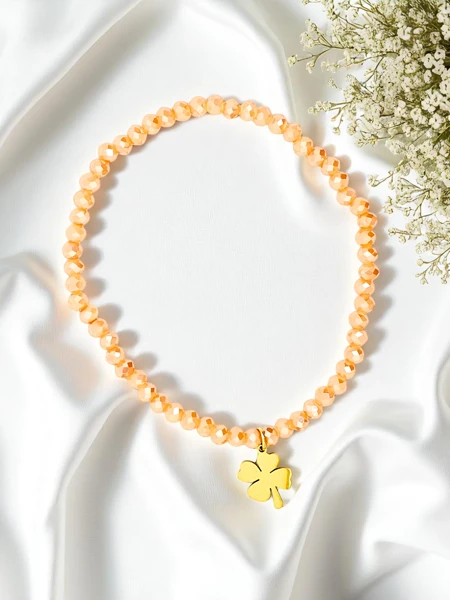 Royalfashion Bransoletka damska z zawieszką koniczynki