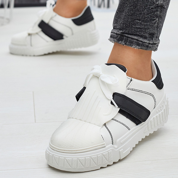 Royalfashion Czarno-białe damskie buty sportowe z gumowymi wstawkami Inika