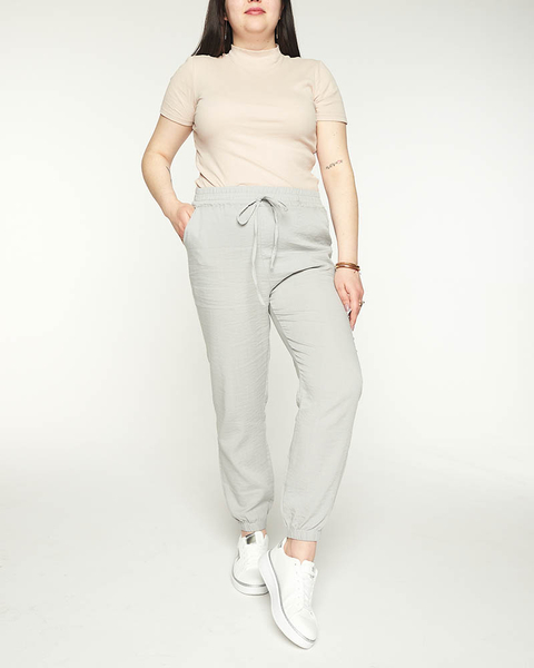 Royalfashion Damskie szare spodnie materiałowe typu joggery PLUS SIZE