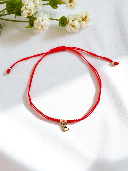 Bransoletka damska z literką "E"