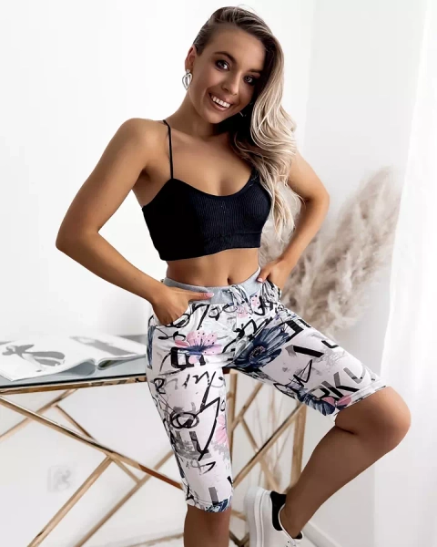 Royalfashion Biało- niebieskie spodenki damskie 3/4 z printem