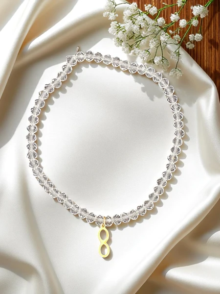 Royalfashion Bransoletka damska z zawieszką nieskończoności