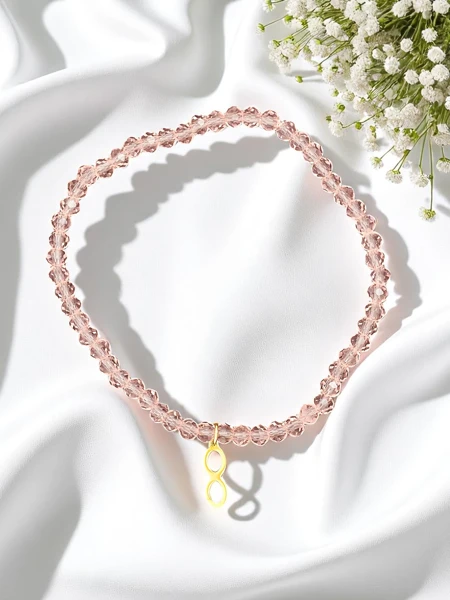 Royalfashion Bransoletka damska z zawieszką nieskończoności