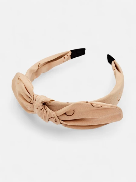 Royalfashion Dziecięca opaska do włosów z kokardką z printem w uśmiechnięte buźki