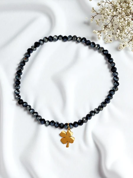 Royalfashion Bransoletka damska z zawieszką koniczynki