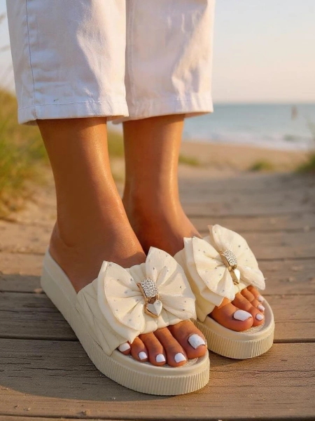 Royalfashion Жіночі шльопанці на платформі з бантиком Sento Pace