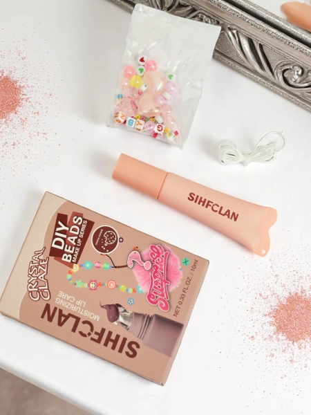 Błyszczyk do ust z bransoletką Gloss & Charm Cocoa Cookie