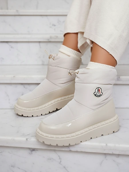 Royalfashion Wsuwane śniegowce damskie w kremowym kolorze Ireda