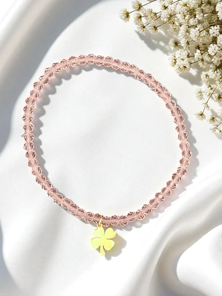 Royalfashion Bransoletka damska z zawieszką koniczynki