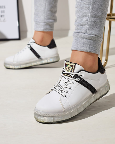 Royalfashion Sportowe buty damskie w kolorze białym z czarnymi wstawkami Asxa