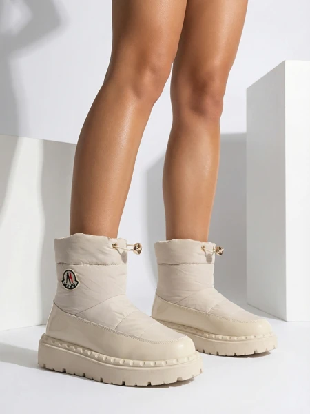 Royalfashion Wsuwane śniegowce damskie w kremowym kolorze Ireda