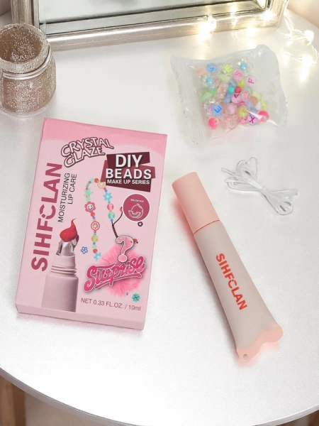 Błyszczyk do ust z bransoletką Gloss & Charm Melon Pop