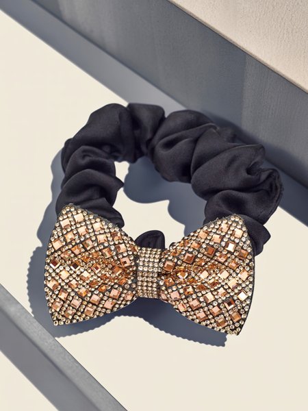 Royalfashion Gumka do włosów z ozdobną kokardką Bellissa