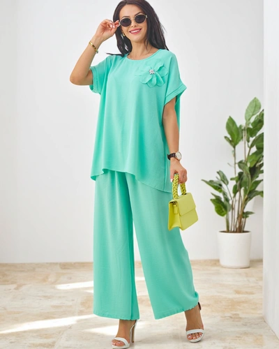 Royalfashion Damski komplet z krótkim rękawem, ozdobnym kwiatem i szerokimi spodniami