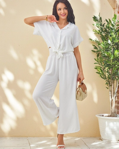 Royalfashion Damski komplet z wiązaną koszulą z krótkim rękawem i poszerzanymi spodniami z cyrkoniami