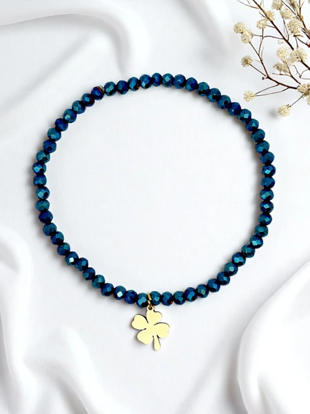 Royalfashion Bransoletka damska z zawieszką koniczynki