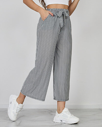 Royalfashion Szerokie spodnie damskie w paski 7/8