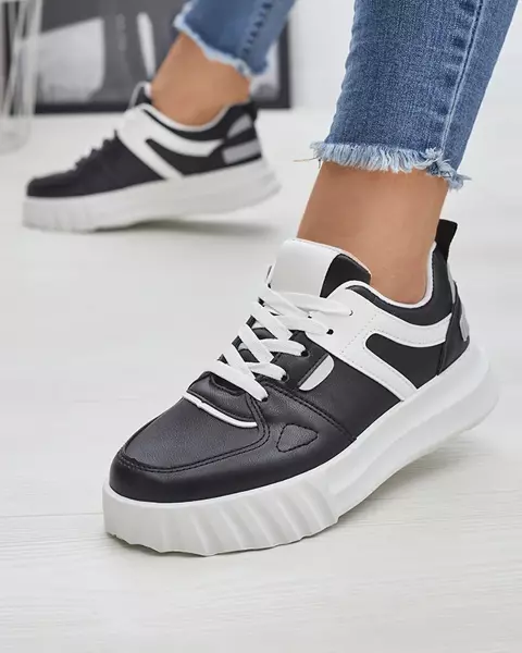 Royalfashion Eko-skórzane damskie czarne casualowe buty sportowe z białymi wstawkami Netiris